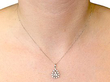 diamond cluster pendant white gold wearing