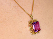 vintage amethyst pendant on neck