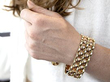 Chunky Gold Bracelet on Wrist
