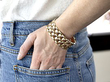 mixed gold bracelet on wrist