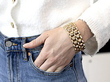 wearing a vintage gold chunky bracelet