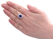 sapphire cluster ring on hand