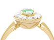 marquise shaped gold and emerald ring