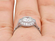 Platinum and Diamond Halo Ring on finger