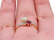 Ruby and Diamond Twist Ring on finger