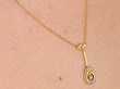 Antique Gold and Seed Pearl Necklace on neck