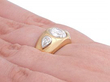 diamond style signet ring on hand