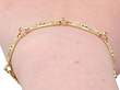 wearing Vintage Ruby and Diamond Bracelet in Yellow Gold for Sale