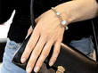 wearing an opal and diamond Victorian bracelet