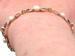 wearing antique pearl and diamond bracelet