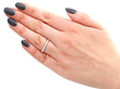 gold eternity ring on hand