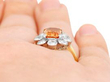 golden topaz ring in yellow gold being worn