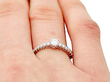 diamond ring with diamond shoulders on model