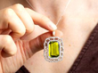 wearing a peridot and diamond Edwardian pendant