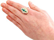 wearing 1930's emerald ring with diamonds