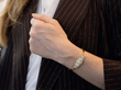 opal and diamond bracelet on wrist