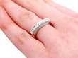 Half eternity ring on finger
