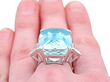 large aquamarine ring on hand