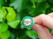 emerald and diamond halo ring outside