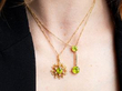 wearing peridot pendants