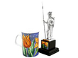 Silver Soldier Trophy next to a mug