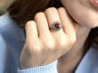 wearing a garnet ring