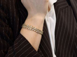 wearing gold and diamond bracelet