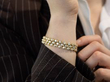 gold diamond bracelet on wrist