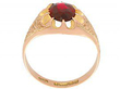 setting of Garnet and Rose Gold Ring