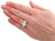 wearing a Three Stone Diamond Ring in White Gold 