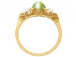 cats eye ring in yellow gold with diamonds setting