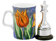 Sterling Silver Chess Ornament next to a mug