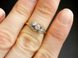 Three Stone Diamond Twist Ring On Hand