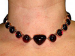 wearing a garnet choker