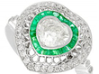 Contemporary Heart Shaped Emerald and Diamond Ring