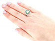 Heart Shaped Emerald and Diamond Ring Wearing 