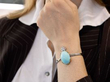 wearing turquoise bangle