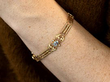 wearing an aquamarine bracelet