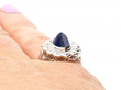 Wearing Blue Sapphire Cabochon Ring