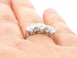 Three Stone Engagement Ring on Finger