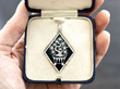 boxed onyx and diamond pendant