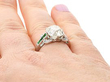 Diamond Solitaire with Emerald Side Stones