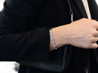 wearing a pearl and diamond bracelet