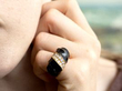 wearing gold onyx chunky ring
