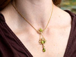 wearing peridot pendant