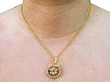wearing ruby and pearl pendant