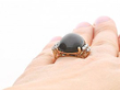 Star Onyx Ring with Diamonds on finger