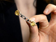 holding citrine and onyx brooch