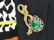 Cabochon Emerald Brooch in Gold