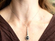 wearing onyx pendant